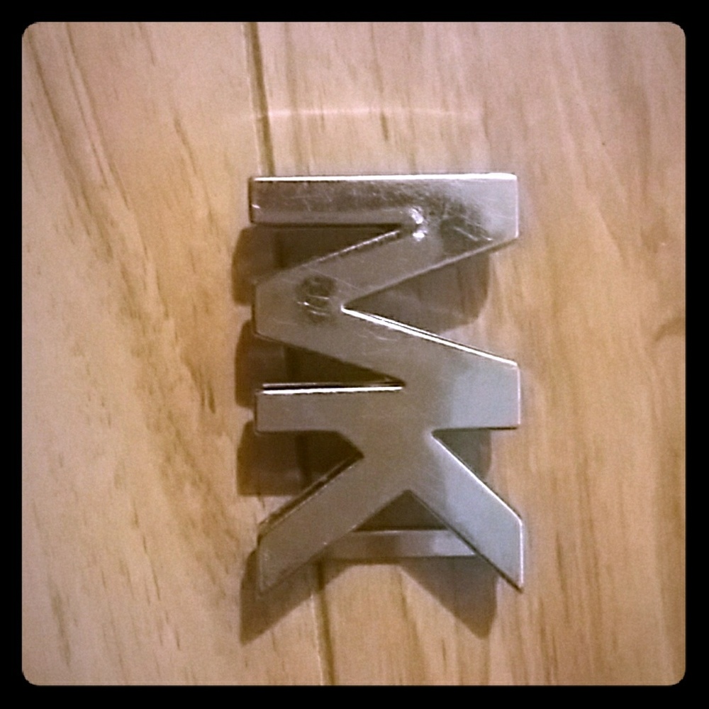 MK belt buckle